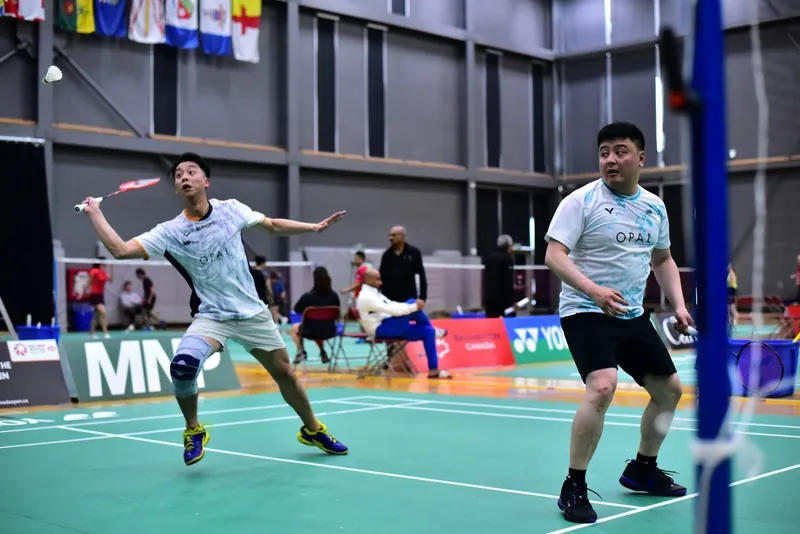 Ken mid-rally on court